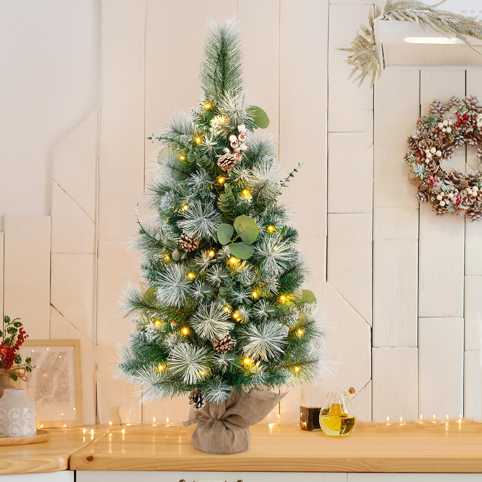 komfotteu-mini-christbaum-64-cm-mit-tannenzapfen-und-led-tisch-weihnachtsbaum image 2